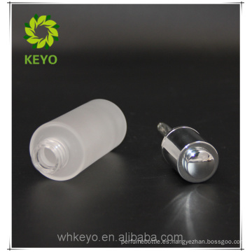 Botella de vidrio cosmético esmerilado 30ml con bomba de plata